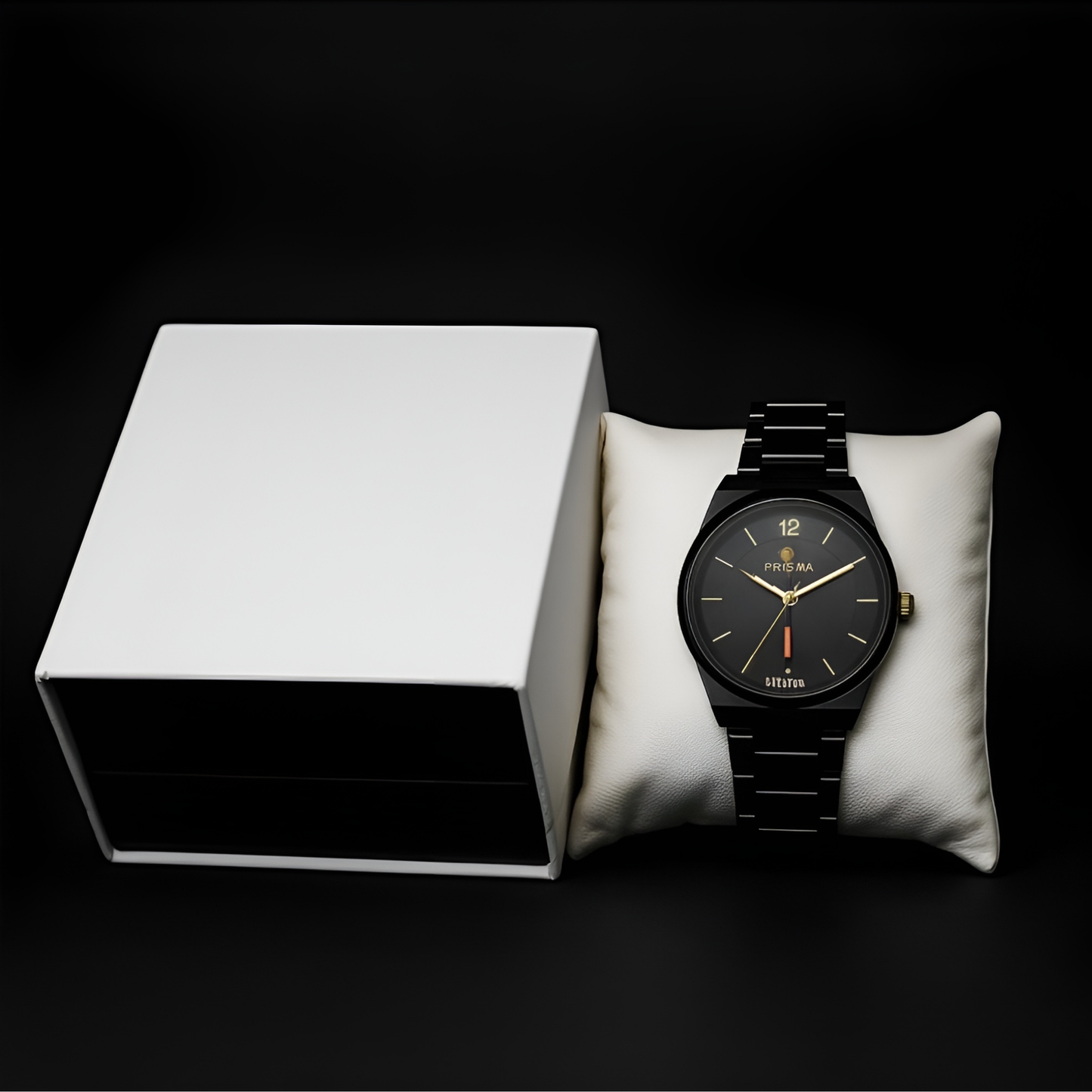 Black wristwatch on a white cushion next to an open white box on a black background